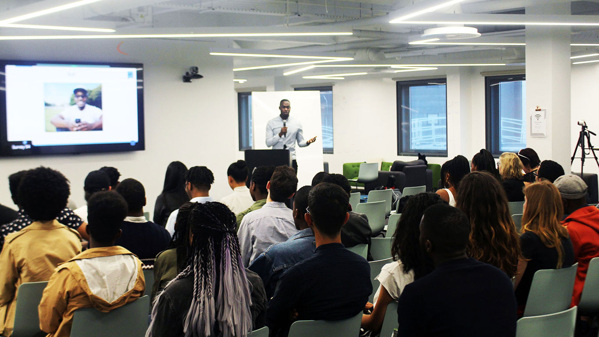 Stephan speaking at event